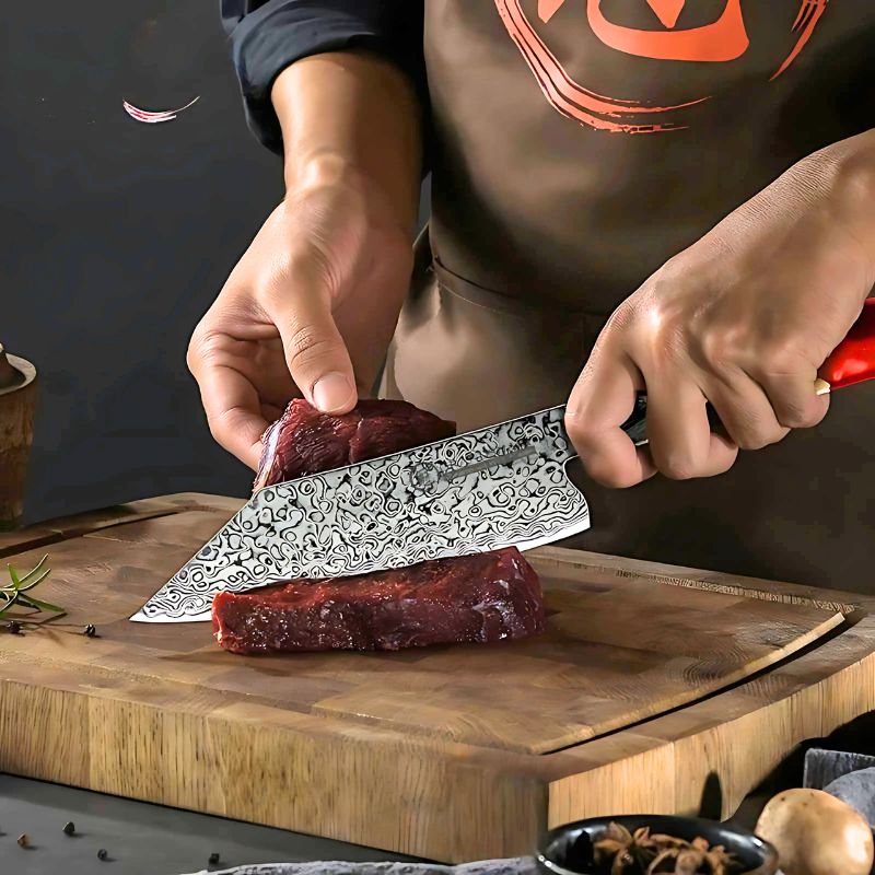 A 5.5-inch Japanese Bunka knife with a Damascus steel blade and a handle that appears to be made of wood and resin with a modern design.