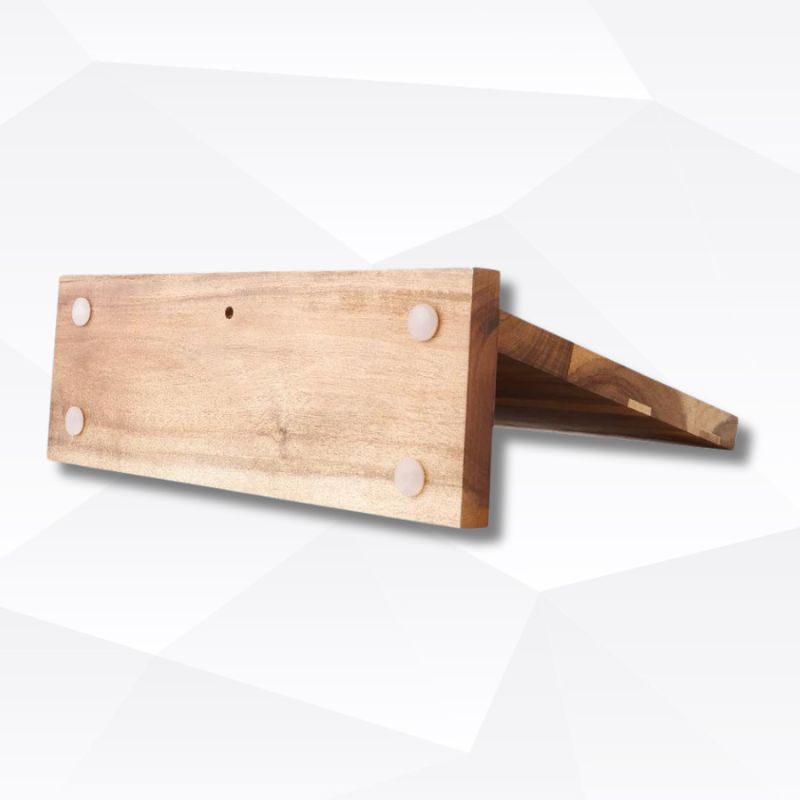 A wooden magnetic knife holder with a sleek design, mounted on a surface.