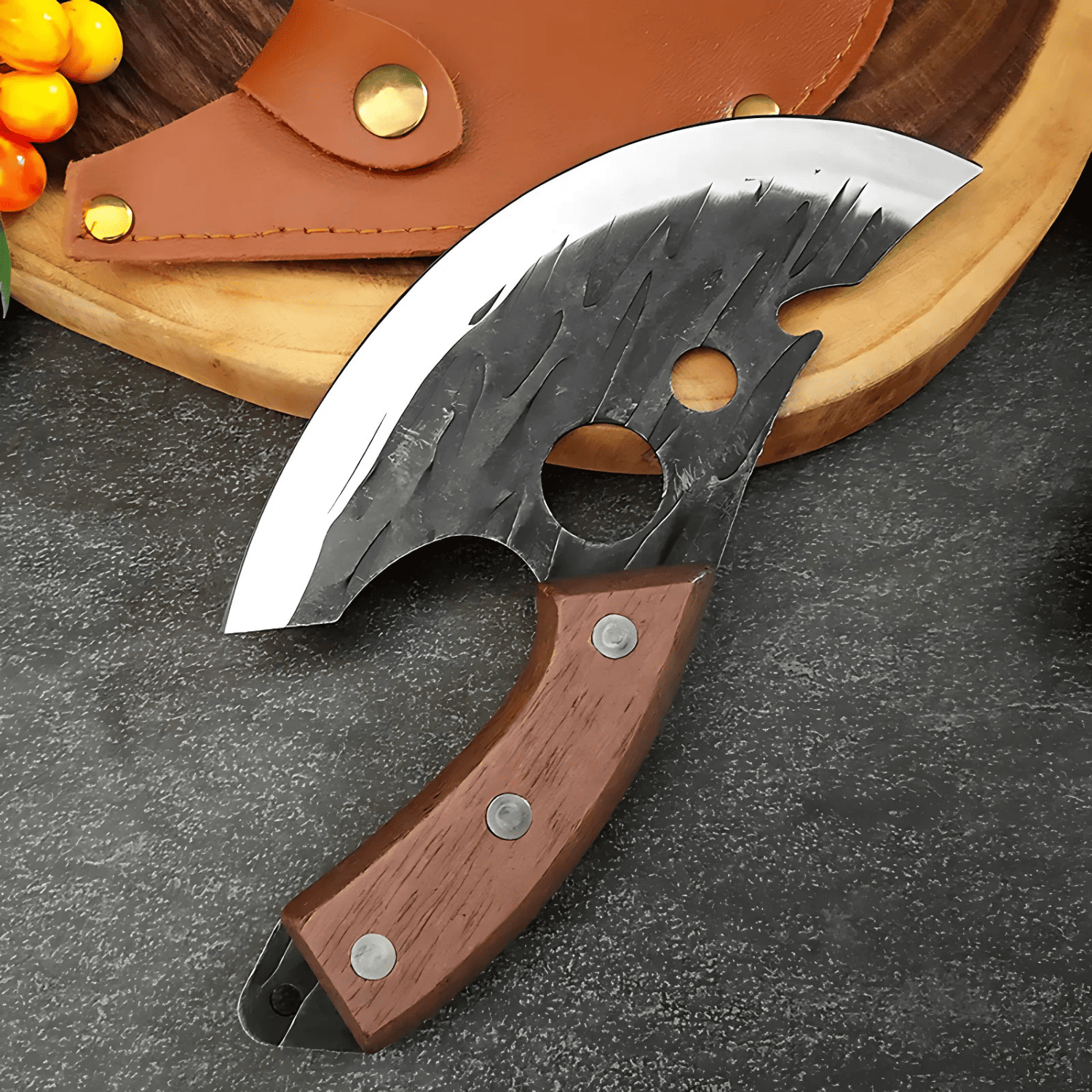 Faux dagger with wooden handle and metal blade on a dark surface