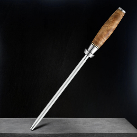 A Chef Emery Knife Sharpener Rod with a metal body and a brown wooden handle, standing upright on a grey surface.