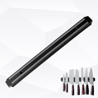 Wall-mounted magnetic knife holder with sharp blades neatly organized