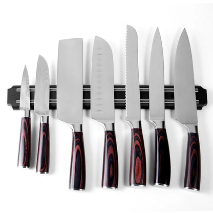 Wall-mounted magnetic knife holder with sharp blades neatly organized
