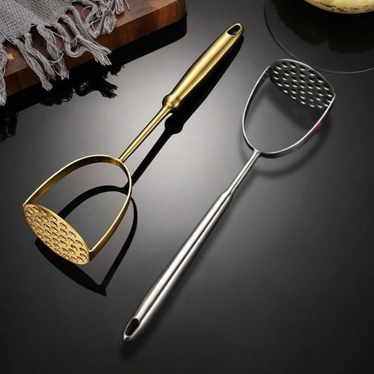 Ergonomic kitchen tool for mashing potatoes and soft vegetables