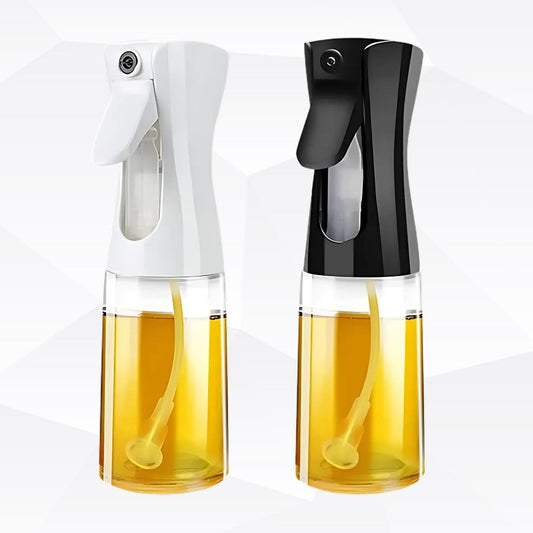 Transparent oil spray bottle with ergonomic trigger and modern design