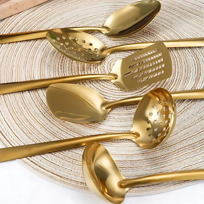 Six-piece golden stainless steel utensil set with ergonomic handles
