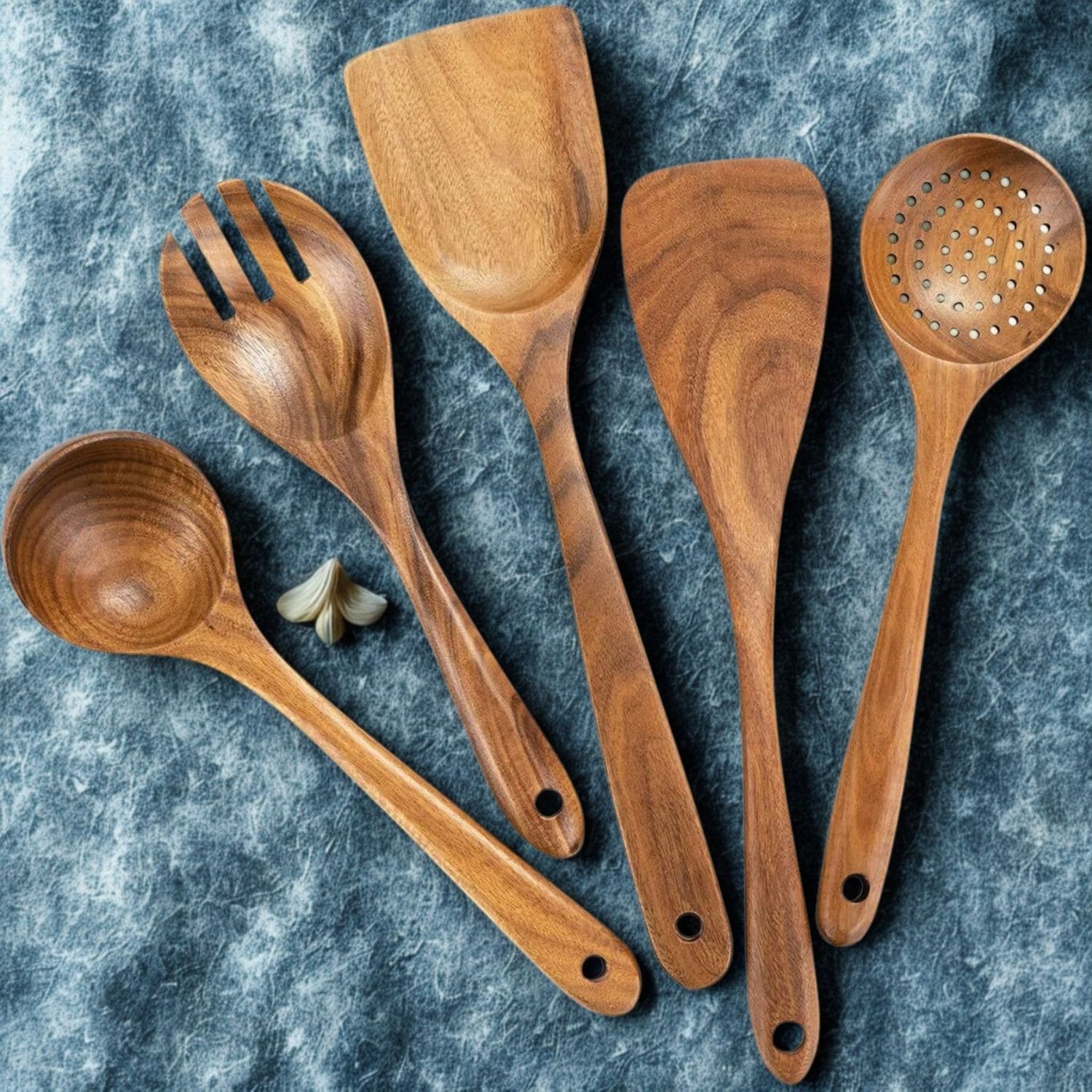 Eco-friendly wood utensil set displayed on a modern kitchen countertop